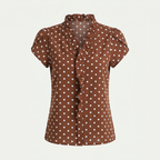 Women's polka dot ruffle-neck blouse in brown, back view