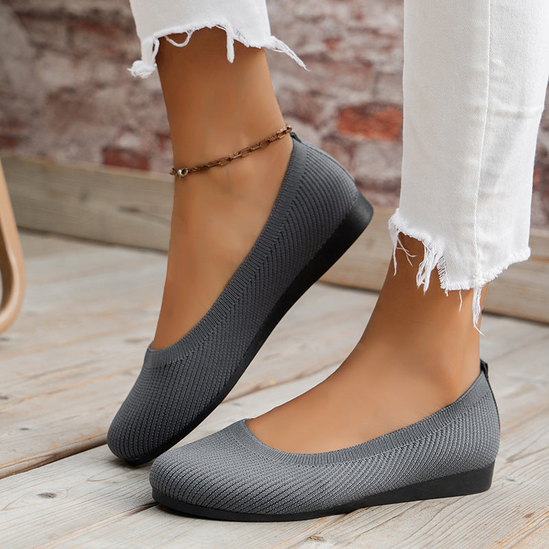 Round toe ballet flats side view