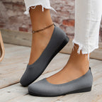 Round toe ballet flats side view