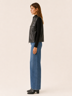 Sleeveless zip-front utility jacket pocket detail