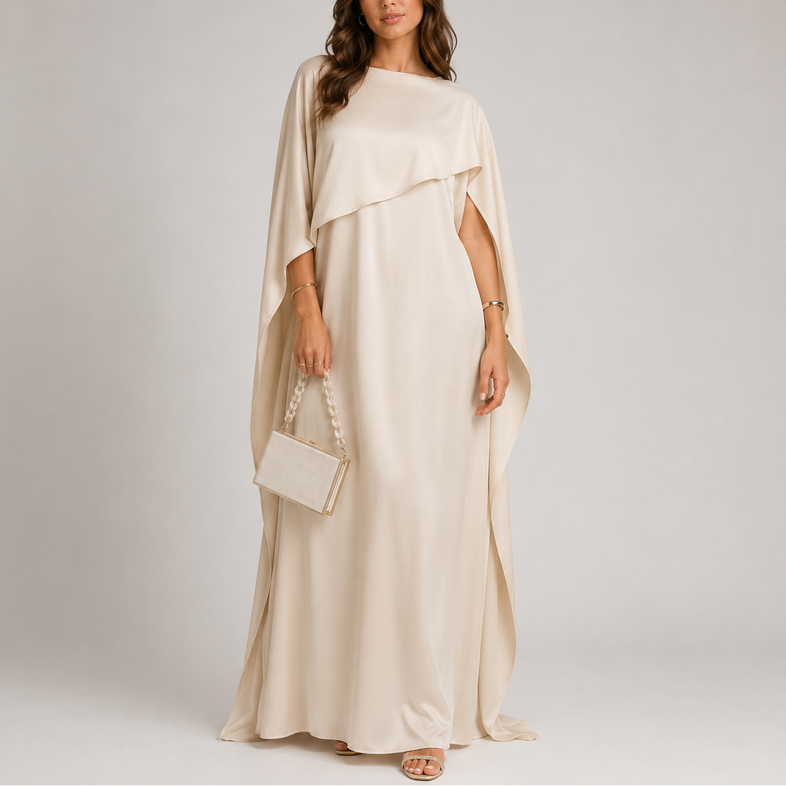 Floor-length draped cape maxi evening dress shown on model