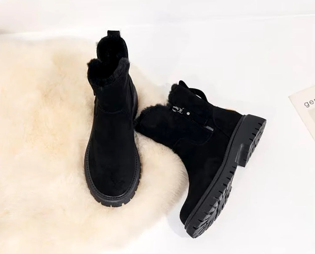 Faux-fur lined winter ankle boot showing soft fur lining