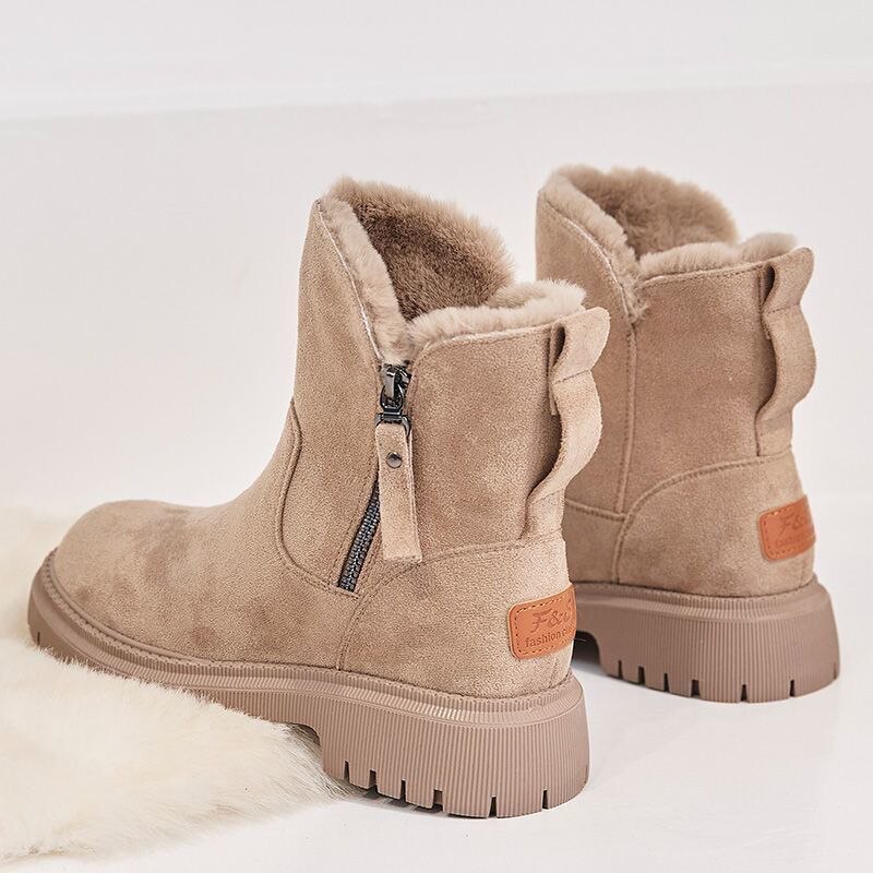 Faux-fur lined winter ankle boots, pair view