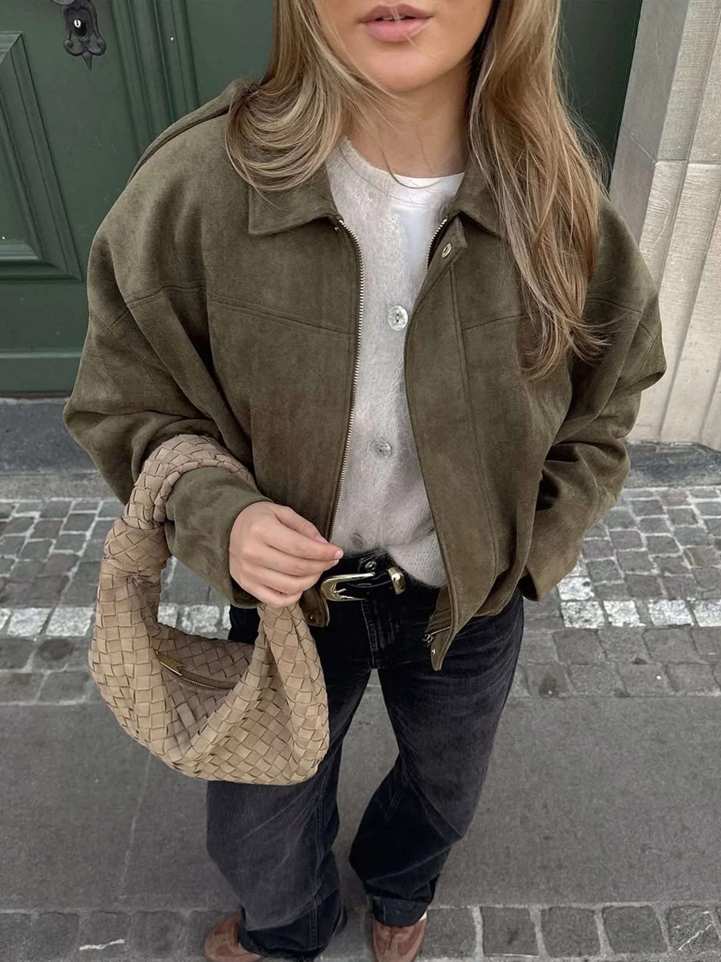 Faux suede bomber jacket showing the structured shirt collar