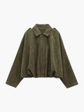 Woman wearing a faux suede collared bomber jacket, front view