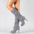 Grey suede knee-high stiletto boots with ring buckle straps