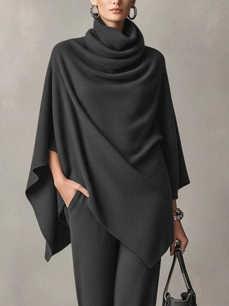 Full-length view of a knitted cowl-neck co-ord set with wide-leg trousers