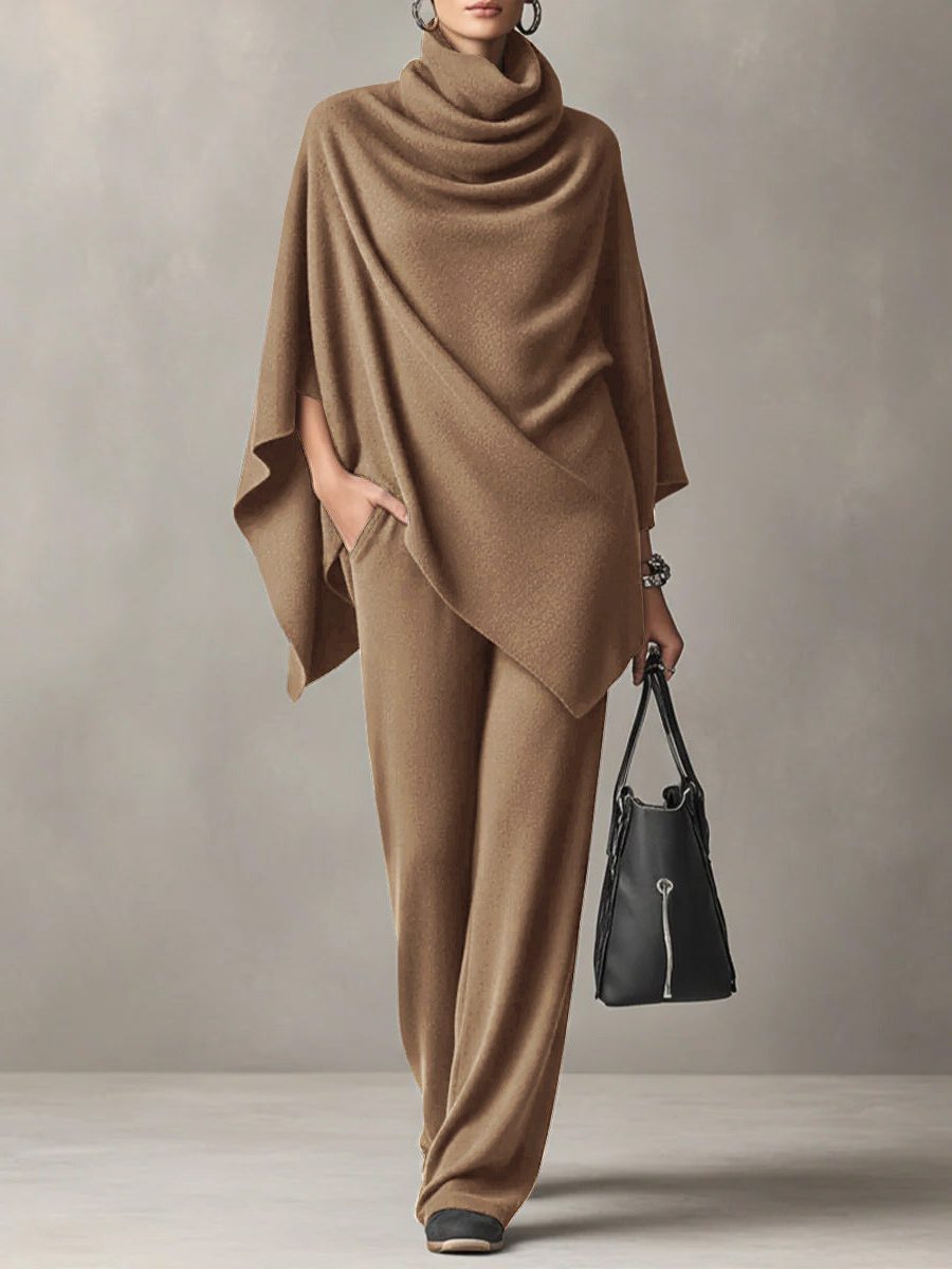Side view of a knitted cowl-neck co-ord set with draped neckline and wide-leg trousers