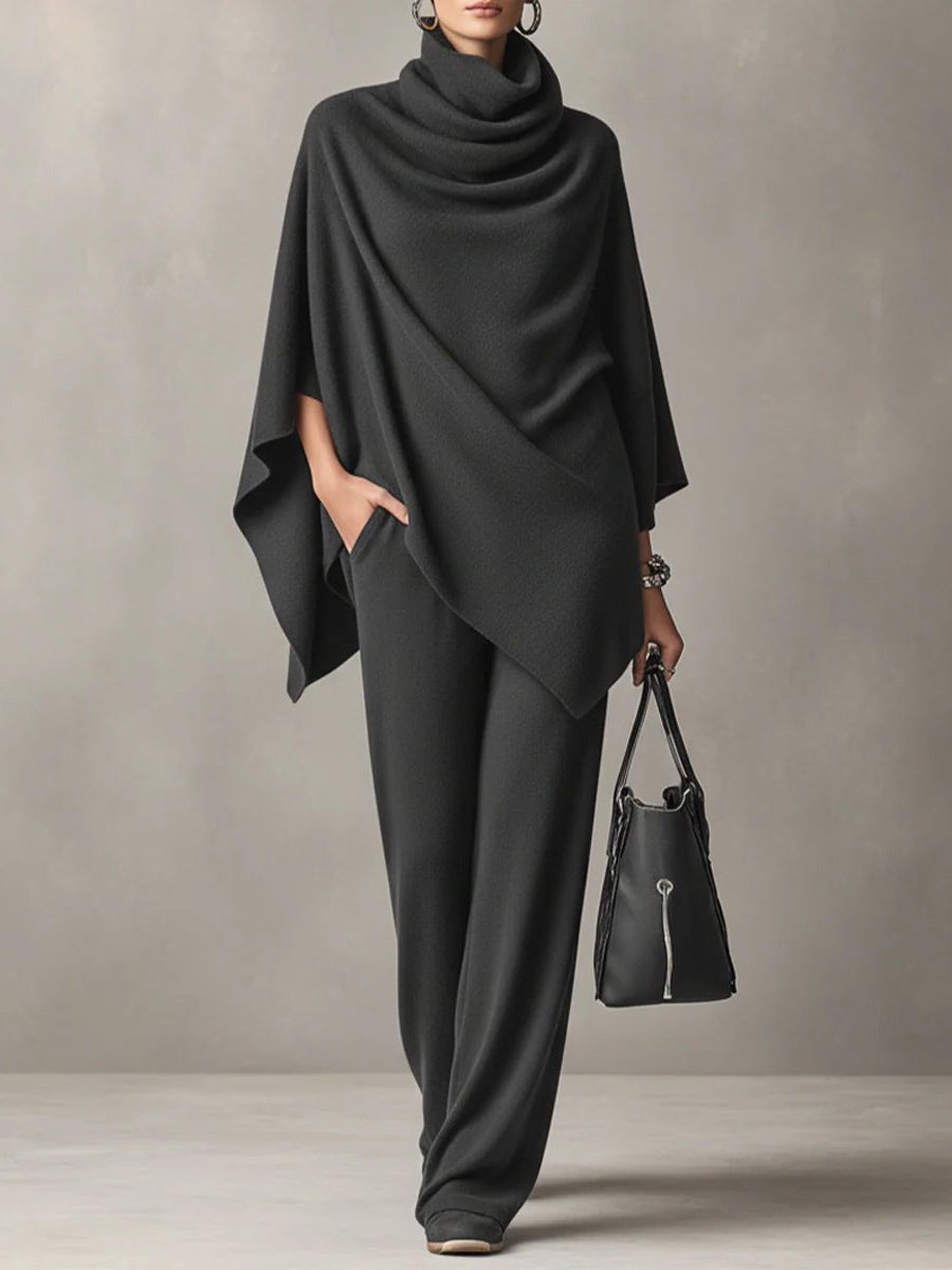 Detail of the wide-leg trousers from a knitted cowl-neck co-ord set