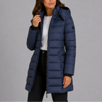 Woman wearing a long hooded puffer coat with full front zip