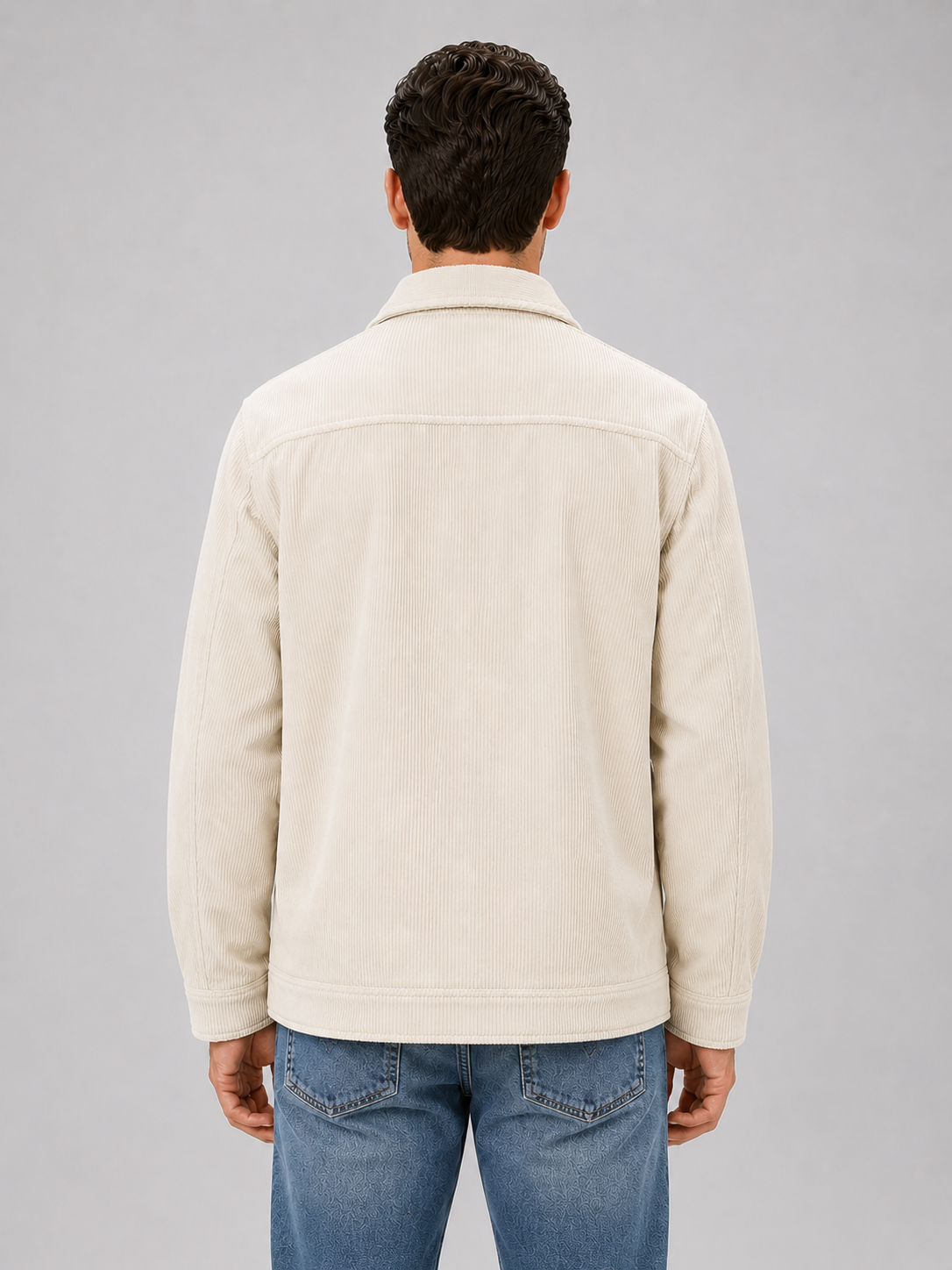 Men's corduroy overshirt jacket, side view showing relaxed fit on model