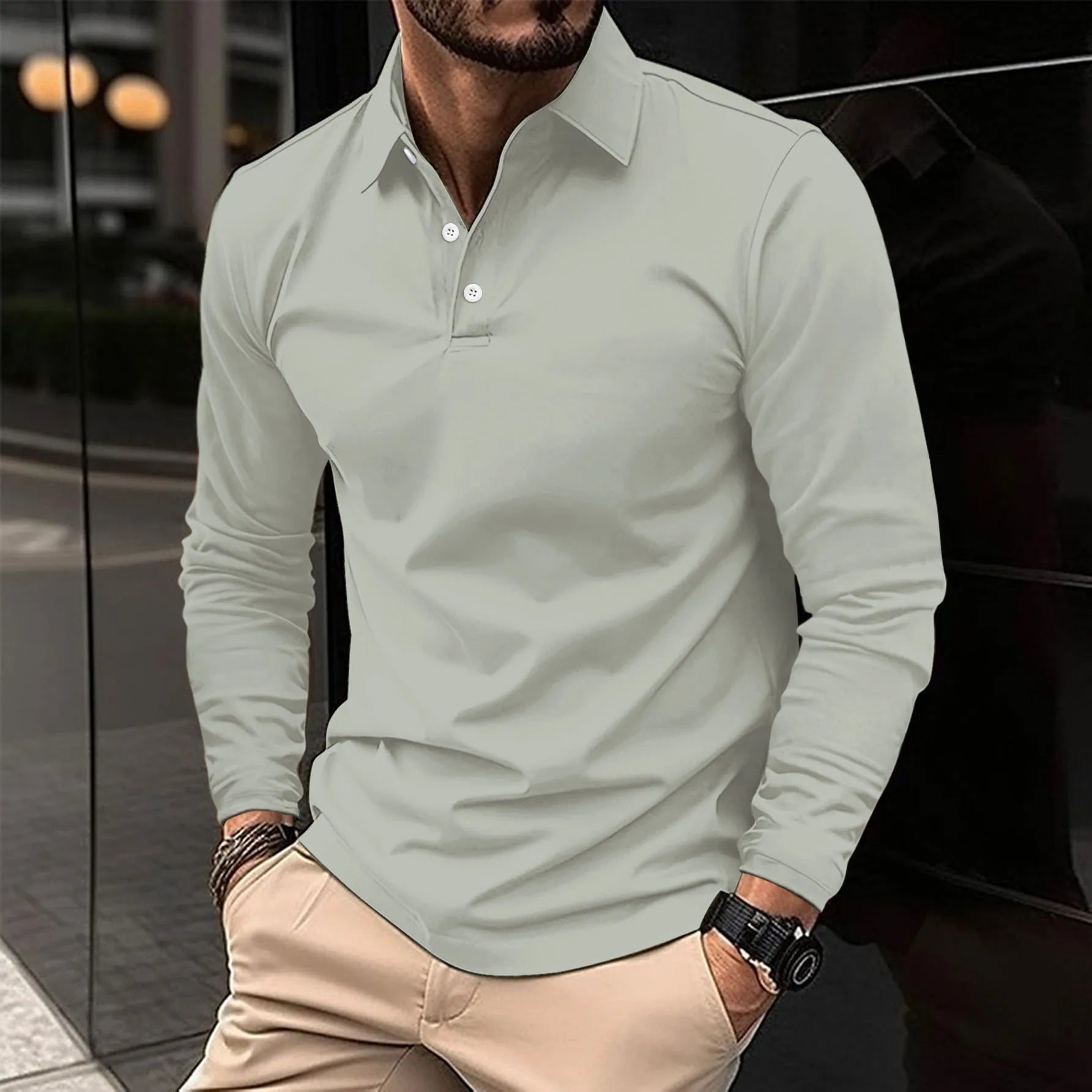 Slim-fit long sleeve polo shirt worn with tailored trousers