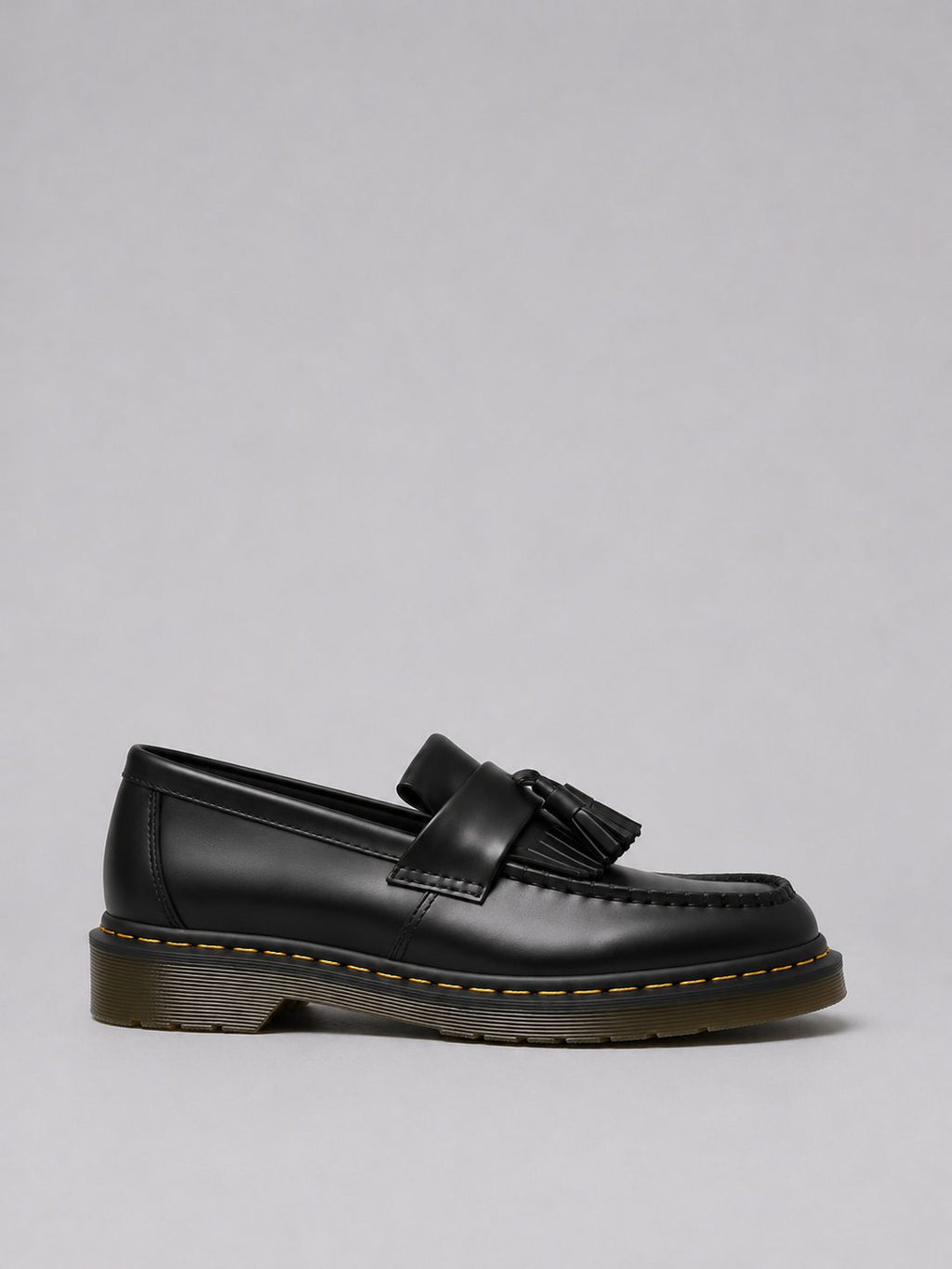 Men's black slip-on loafer with tassel detail
