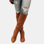 Over-the-knee block heel boots, angled view