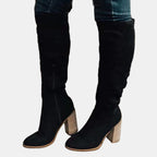 Over-the-knee block heel boots styled on feet