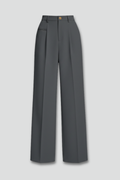 Women's wide-leg palazzo trousers with pleated front, worn by a model, front view