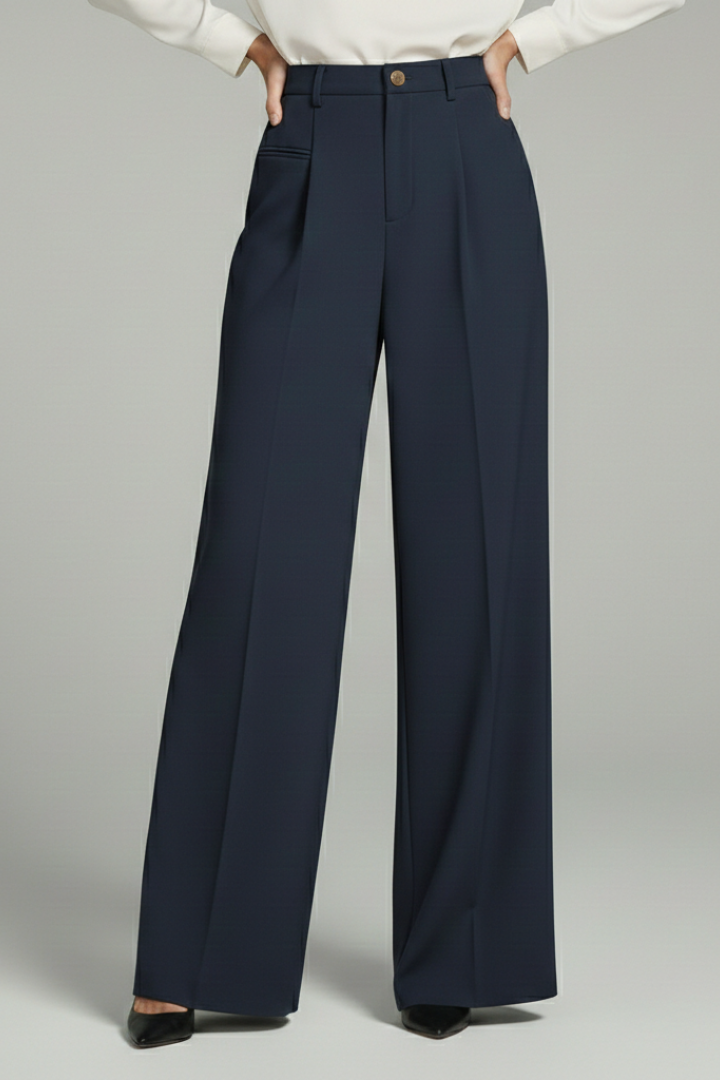 Wide-leg pleated trousers on a model, full-length view