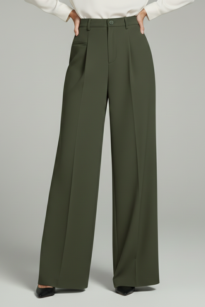 Palazzo trousers with tailored pleats and wide legs on a model