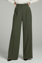 Palazzo trousers with tailored pleats and wide legs on a model