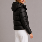 Back view of a hooded quilted puffer jacket