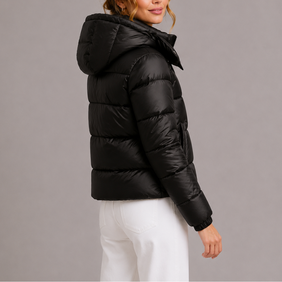 Back view of a hooded quilted puffer jacket