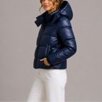 Woman wearing a lightweight quilted hooded puffer jacket