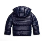 Side view of a quilted hooded puffer jacket