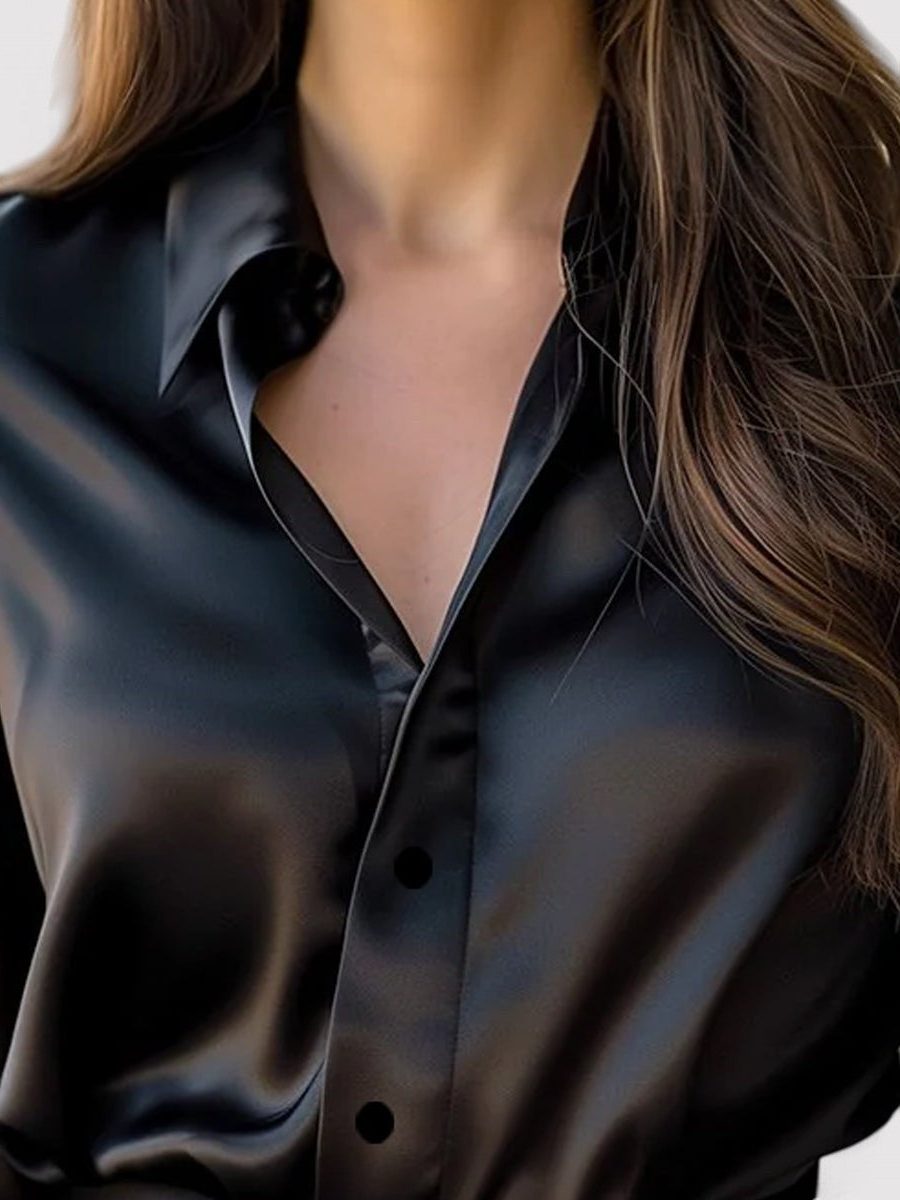 Satin blouse showing long sleeve and relaxed fit