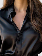 Satin blouse showing long sleeve and relaxed fit