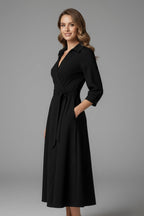Sleeveless wedding guest wrap midi dress, side view