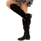 Women's slouchy suede knee-high boots, angled view