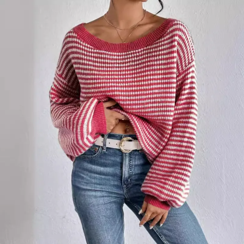 Detail of the voluminous sleeve and ribbed cuff on a knit sweater