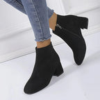 Women's suede block heel ankle boots angled view