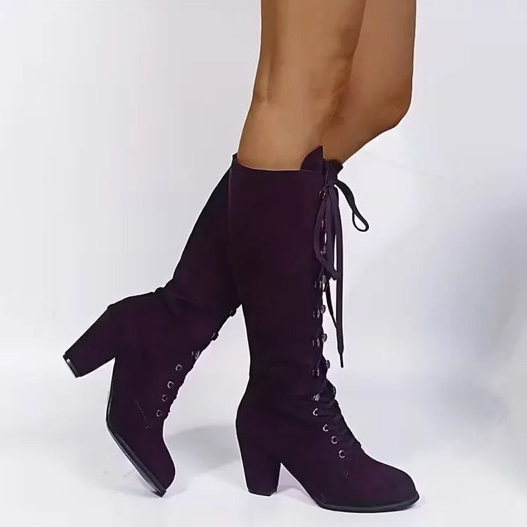 Women's suede lace-up knee-high boots angled view