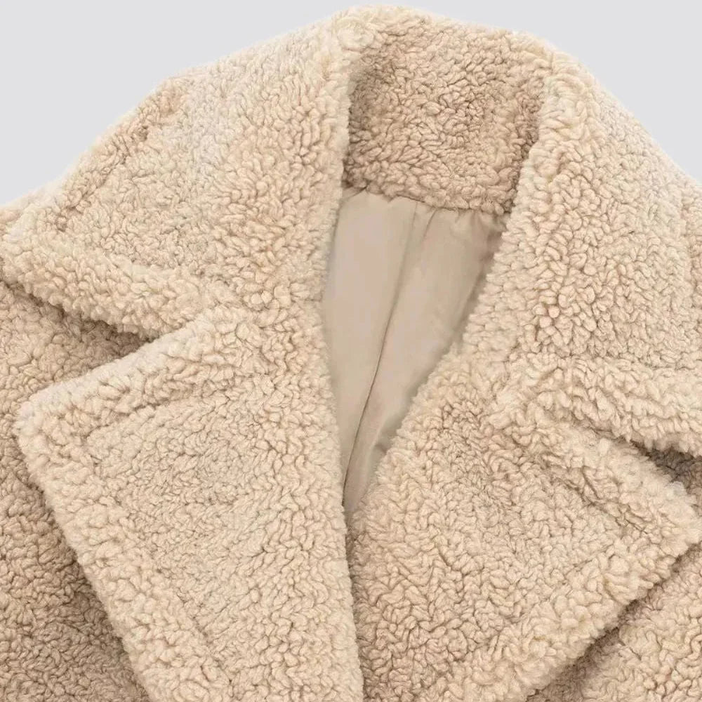 Detail of a soft teddy faux fur coat