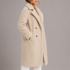 Longline teddy faux fur coat shown on a model