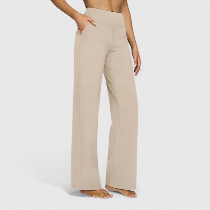 Women's wide-leg pull-on trousers with a wide waistband, worn by a model, front view