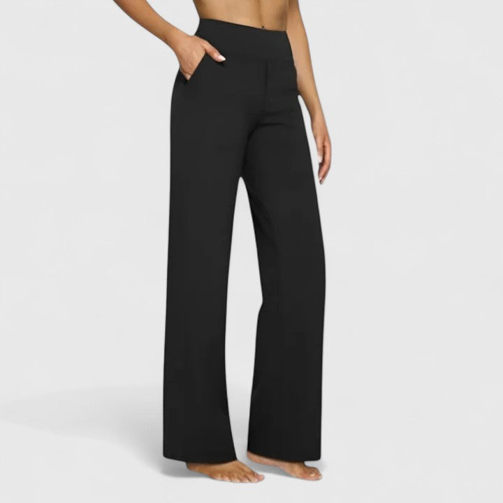 Wide-leg trousers with a supportive wide waistband shown on a model