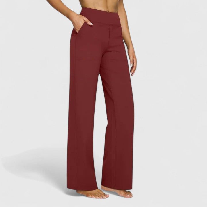 Detail of the wide waistband and side pocket on the trousers