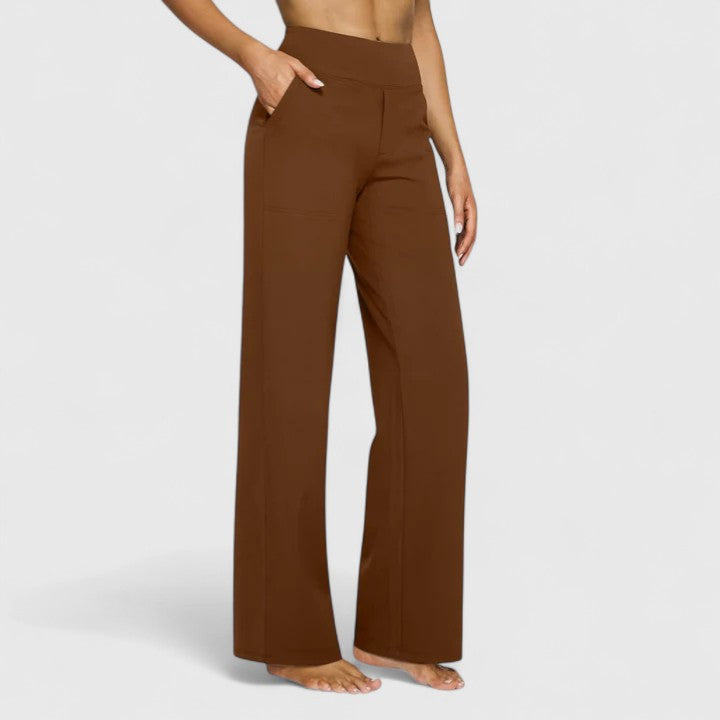 Model showing the back of the wide-leg trousers with back pockets