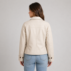 Beige cropped button-front jacket shown from an alternative angle on model