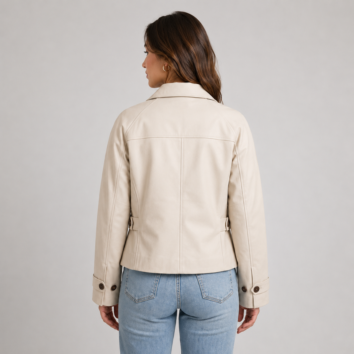 Beige cropped button-front jacket shown from an alternative angle on model