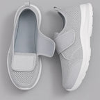 Grey women's walking shoe with hook-and-loop strap
