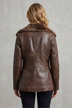 Close-up detail of faux shearling collar and gunmetal zip
