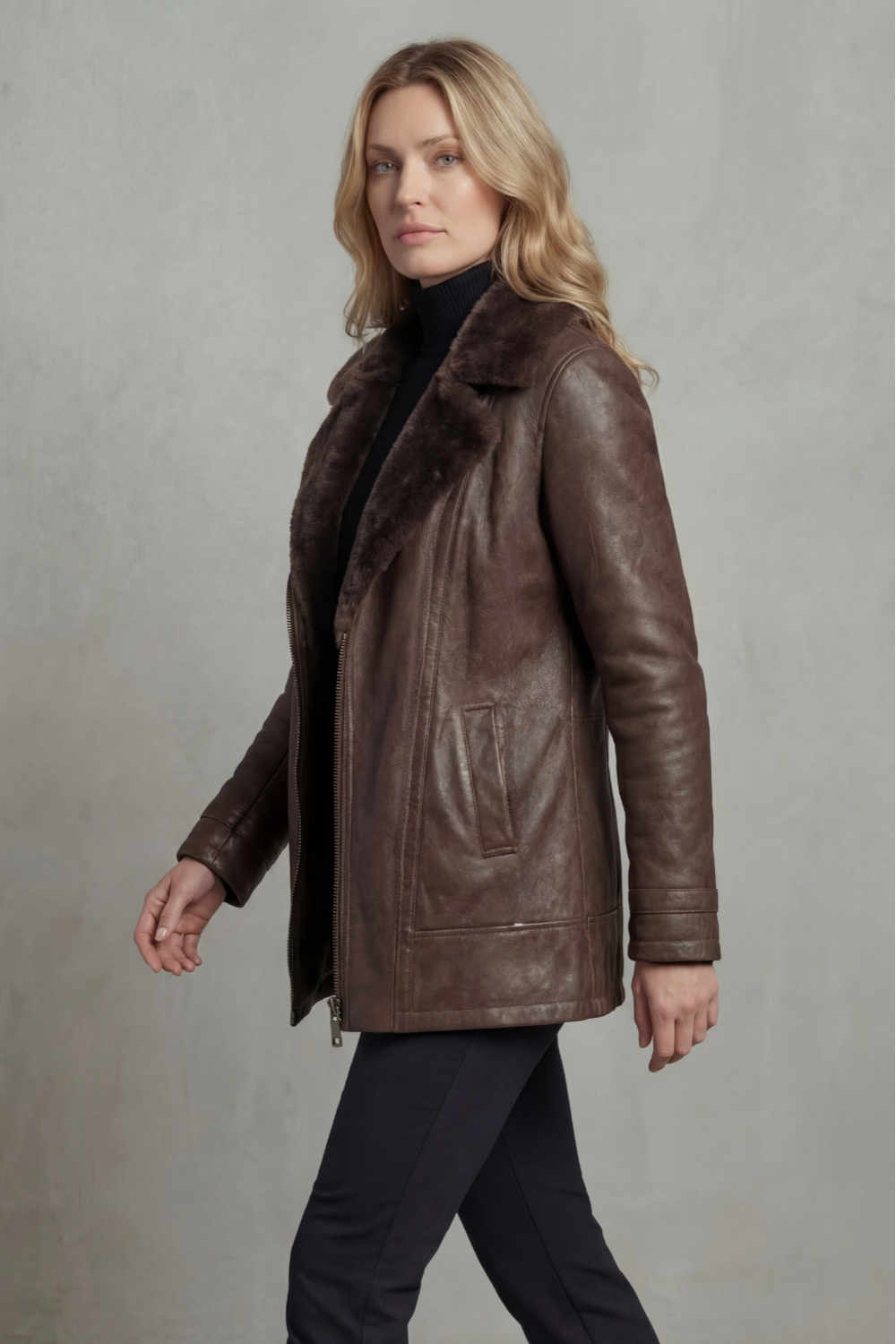 Front view of brown faux leather jacket with full-length zip