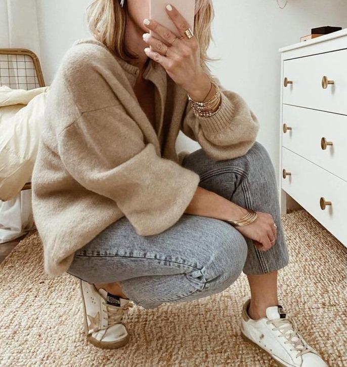 Taupe brushed knit cardigan with ribbed cuffs on model