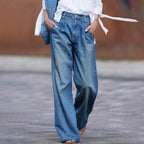 Blue high-rise pleated wide-leg jeans, front view