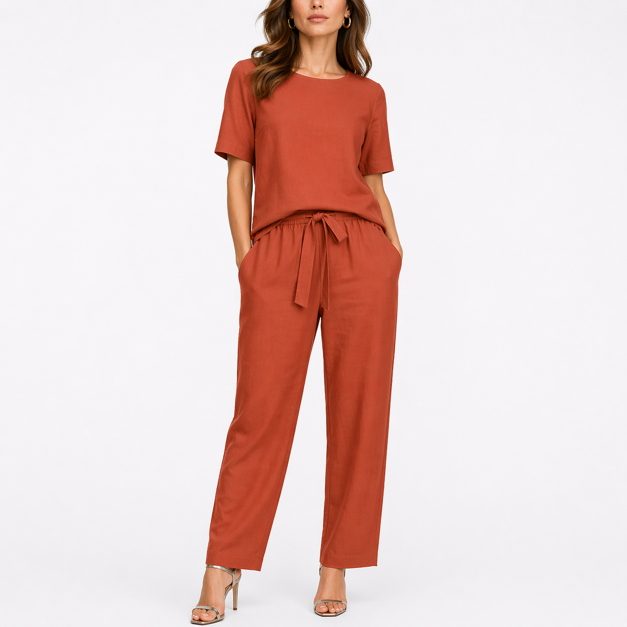 Women's orange two-piece set with short-sleeve top and trousers