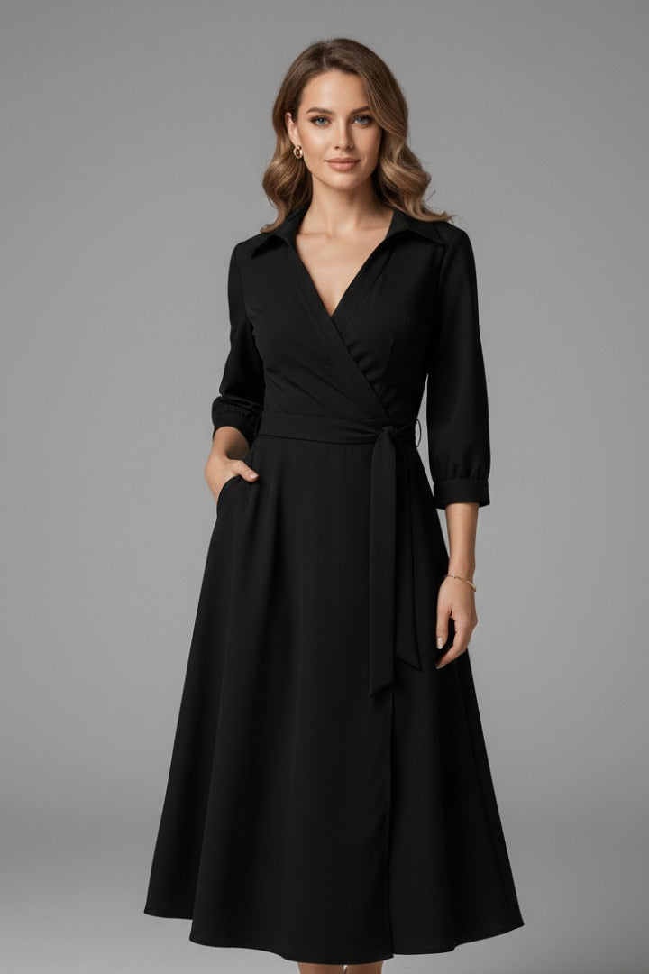 Wrap-front midi dress showing defined waist and drape